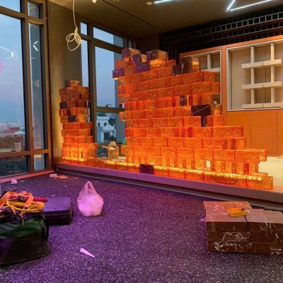Gạch kính màu cam vách decor sân khấu AVSING